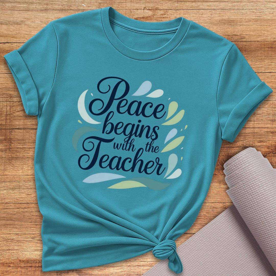 Begins With The Teacher T-Shirt